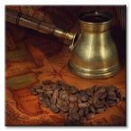obraz na płótnie z ziarnami kawy, młynkiem i starą mapą