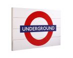 Biały obraz na drewnie przedstawiający znak London Underground