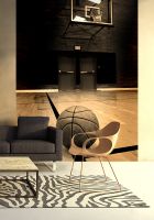 aranżacja fototapety z piłką do koszykówki leżącą na podłodze hali sportowej idealna do powieszenia w biurze
