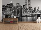 Czarno-biała fototapeta New York na ścianie w salonie z drewnianą, ciemną podłogą