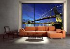 Aranżacja wnętrza z fototapetą ścienną z kolekcji Nice wall na której znajduje się widok z okna na Brooklyn Bridge nocą