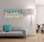 Obraz na płótnie wiszący w salonie na ścianie nad szarą sofą przedstawia przedstawiający nadmorskie, kolorowe budynki