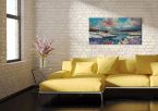 Obraz na płótnie wiszący w salonie na ścianie nad żółtą kanapą przedstawiający zimowy, górski krajobraz i rzekę