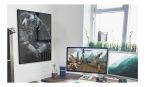 Plakat z gry The Elder Scrolls V Skyrim w pokoju gracza na ścianie