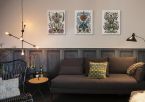 Obrazy na płótnie Folk Floral wiszące w salonie nad grafitową kanapą