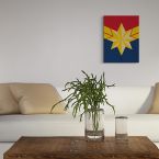 Obraz na płótnie Kapitan Marvel Logo umieszczony w salonie nad kanapą