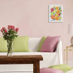 Canvas pod tytułem Cytrusy wykonany przez Cat Coquillette powieszony na różowej ścianie w salonie nad kanapą