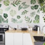 Fototapeta Egzotyczne liście na ścianie w kuchni