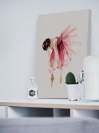 Obraz na płótnie z baletnicą postawiony na półce
