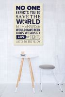 Obraz typograficzny Save The World nad stolikiem kawowym