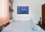 Duża Ryba na plakacie powieszony w sypialni nad łóżkiem