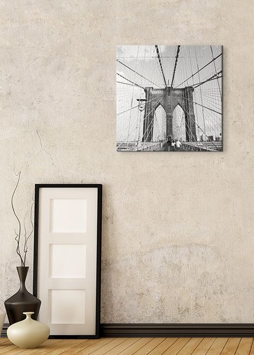 aranżacja obrazu na płótnie z brooklyn bridge na ścianie w kolorze ecru
