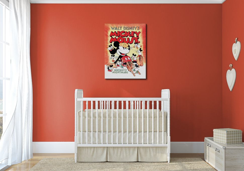 Obraz na płótnie w dziecięcym pokoju przedstawia siedzącą Myszkę Miki Walta Disney