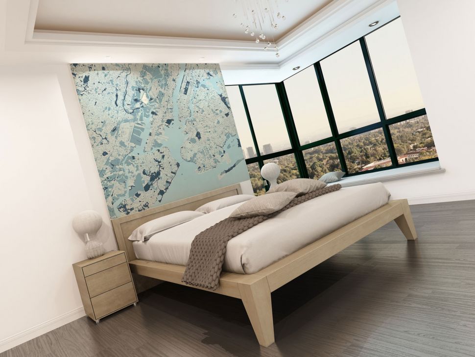 Duża fototapeta mapy Nowego Jorku wisząca w sypialni nad łóżkiem