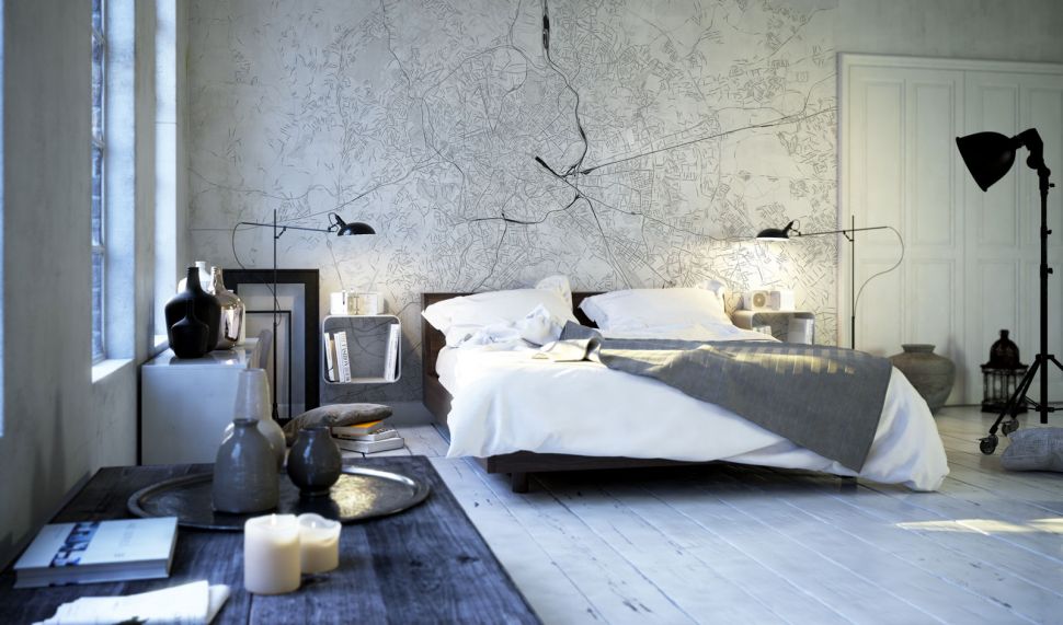 Nowocześnie urządzona sypialnia z wiszącą na ścianie nad łóżkiem fototapetą z mapą Rzymu