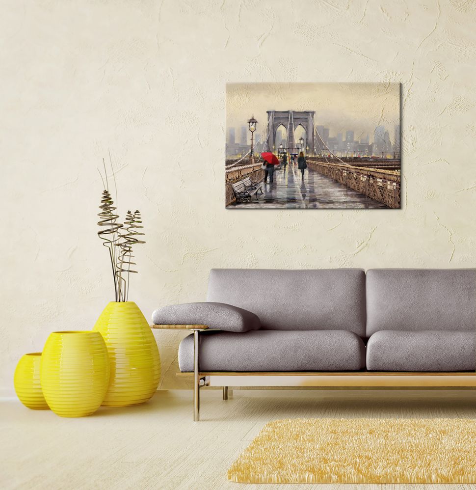 Obraz na płótnie Brooklyn Bridge wiszący w salonie na białej ścianie nad szarą kanapą
