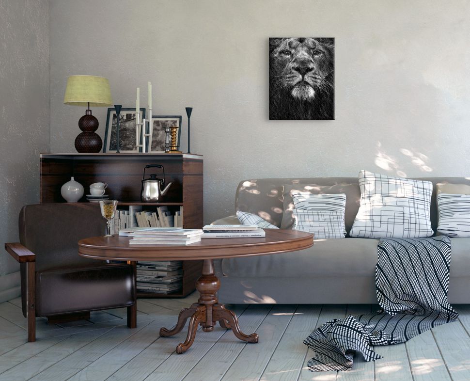 Obraz na płótnie z czarno-białym lwem wiszący w salonie nad kanapą