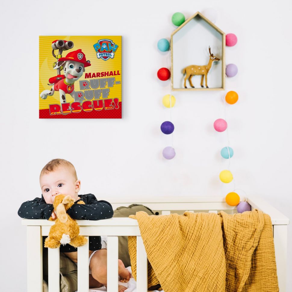 Obraz na płótnie przedstawiający Marshalla z bajki Psi Patrol wiszący w pokoju dziecka